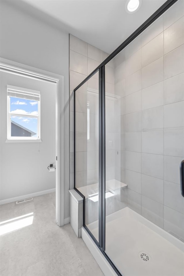 432 Tawny Elm Pkwy, Verona, WI 53593 - bathroom with a stall shower and baseboards