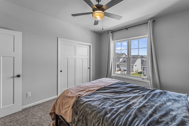 432 Tawny Elm Pkwy, Verona, WI 53593 - carpeted bedroom with baseboards and a ceiling fan