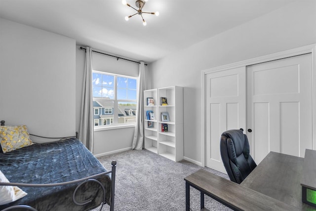 432 Tawny Elm Pkwy, Verona, WI 53593 - bedroom with carpet flooring, baseboards, an office area, a chandelier, and a closet