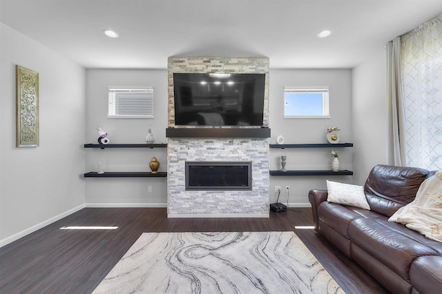 432 Tawny Elm Pkwy, Verona, WI 53593 - living room featuring wood finished floors, a fireplace, baseboards, and recessed lighting