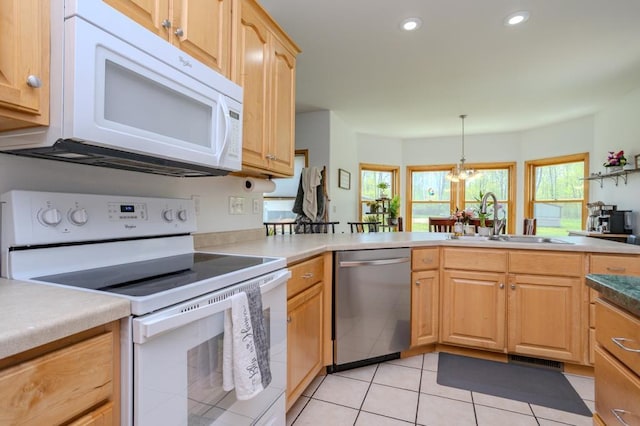175545 Willow Ln, Ringle, WI 54440 - kitchen with white appliances, a sink, recessed lighting, light tile patterned flooring, and light brown cabinetry