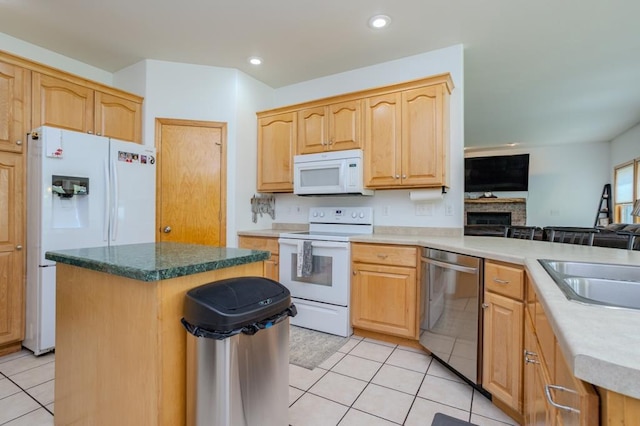 175545 Willow Ln, Ringle, WI 54440 - kitchen with white appliances, light tile patterned flooring, a center island, light brown cabinets, and open floor plan