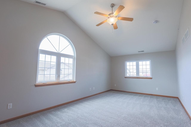 6313 43rd St Unit 162, Kenosha, WI 53144 - empty room with carpet, vaulted ceiling, a ceiling fan, and baseboards