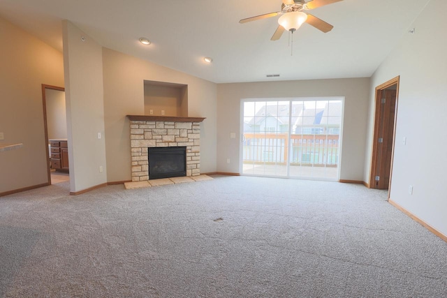 6313 43rd St Unit 162, Kenosha, WI 53144 - unfurnished living room featuring carpet floors, a fireplace, baseboards, and vaulted ceiling
