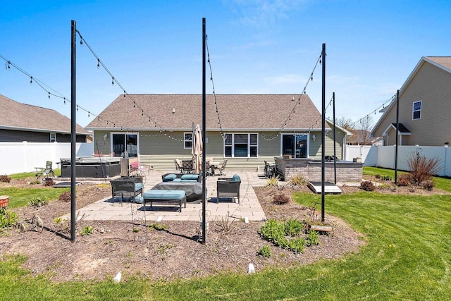 1397 Lear Ln, De Pere, WI 54115 - rear view of house with a hot tub, a patio, and an outdoor living space