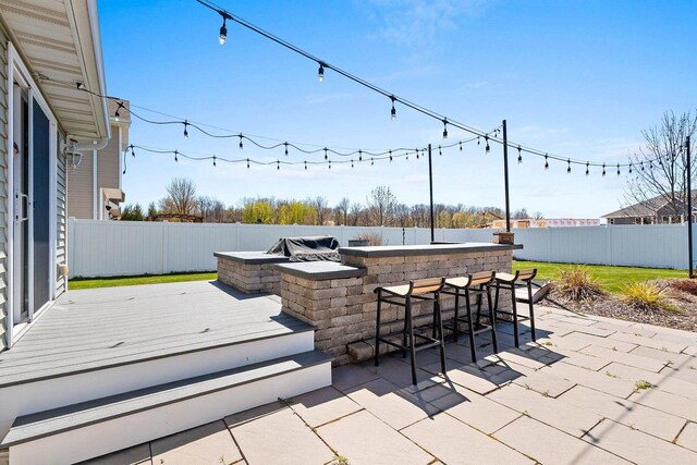1397 Lear Ln, De Pere, WI 54115 - view of patio with a wooden deck and a fenced backyard