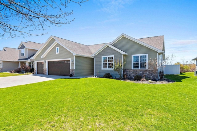 1397 Lear Ln, De Pere, WI 54115 - craftsman inspired home featuring stone siding, an attached garage, a front yard, and concrete driveway