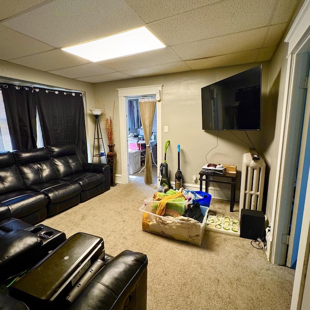 2664 N Booth St, Milwaukee, WI 53212 - living area with carpet floors, a drop ceiling, and radiator heating unit