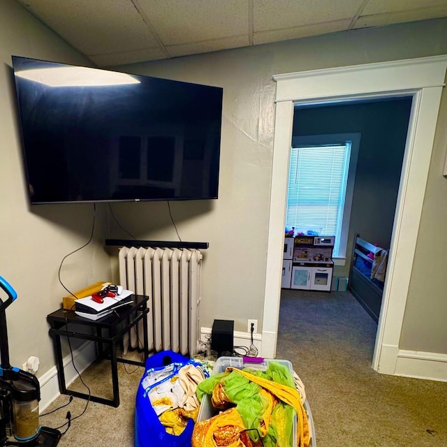 2664 N Booth St, Milwaukee, WI 53212 - carpeted bedroom featuring radiator, a paneled ceiling, and baseboards