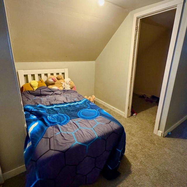 2664 N Booth St, Milwaukee, WI 53212 - carpeted bedroom featuring lofted ceiling and baseboards