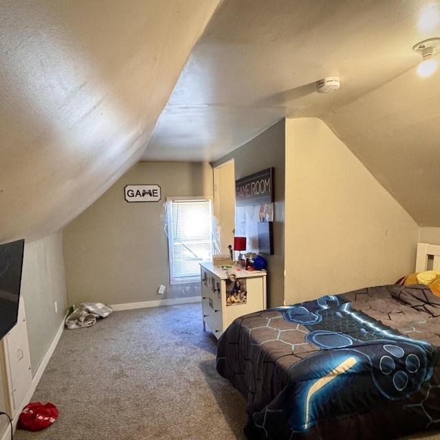 2664 N Booth St, Milwaukee, WI 53212 - carpeted bedroom featuring vaulted ceiling and baseboards