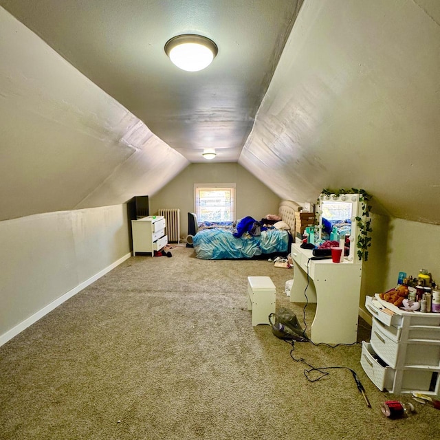 2664 N Booth St, Milwaukee, WI 53212 - carpeted bedroom with radiator, lofted ceiling, and baseboards