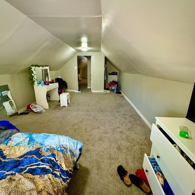 2664 N Booth St, Milwaukee, WI 53212 - carpeted bedroom with lofted ceiling and baseboards