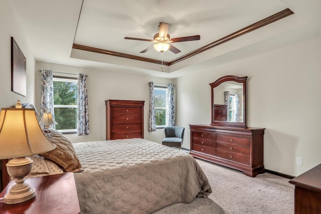 5208 Briarwood Cir, Racine, WI 53402 - bedroom featuring a raised ceiling, carpet floors, ornamental molding, a ceiling fan, and baseboards