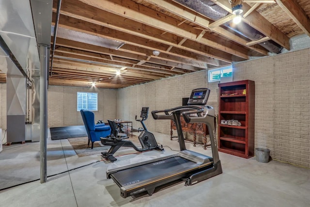 5208 Briarwood Cir, Racine, WI 53402 - exercise area featuring brick wall and plenty of natural light