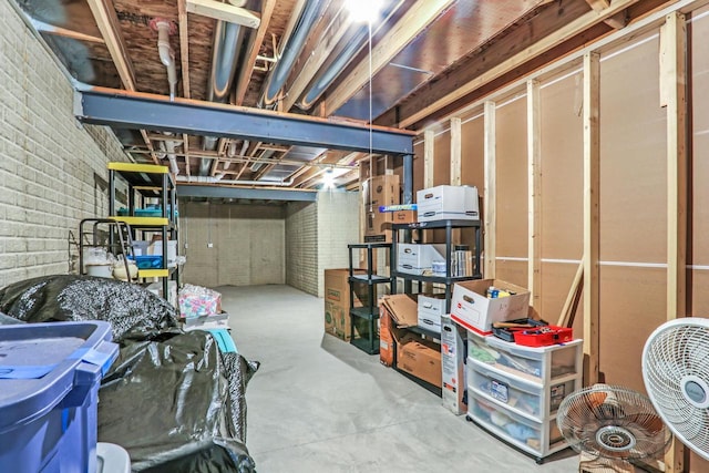 5208 Briarwood Cir, Racine, WI 53402 - unfinished basement with brick wall