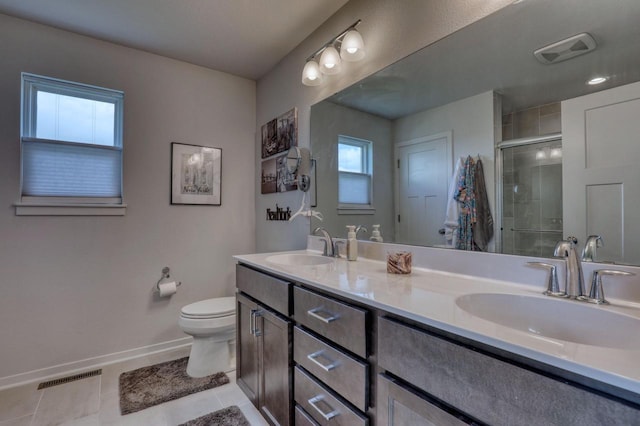 full bathroom with baseboards, a stall shower, tile patterned floors, toilet, and healthy amount of natural light