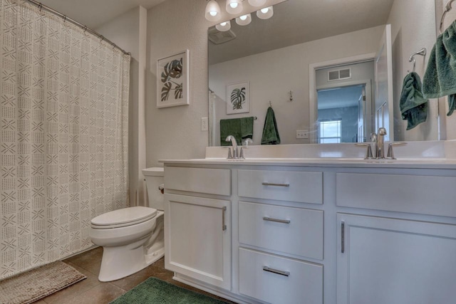 full bath featuring toilet, tile patterned flooring, double vanity, and a shower with curtain