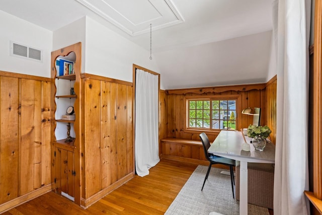 2577 N 89th St, Wauwatosa, WI 53226 - office with attic access, light wood-style floors, vaulted ceiling, wood walls, and wainscoting