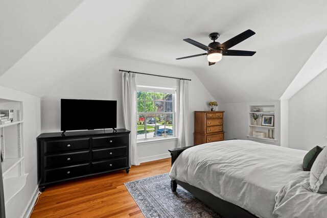 2577 N 89th St, Wauwatosa, WI 53226 - bedroom featuring wood finished floors, lofted ceiling, and ceiling fan
