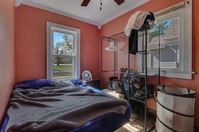 2139 12th St, Eau Claire, WI 54703 - bedroom with crown molding and ceiling fan