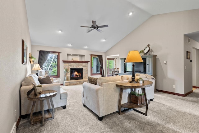 N5798 Lakeview Dr, Green Lake, WI 54941 - living area with a fireplace, light colored carpet, a ceiling fan, baseboards, and recessed lighting