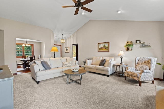 N5798 Lakeview Dr, Green Lake, WI 54941 - living room featuring a ceiling fan, carpet floors, a chandelier, vaulted ceiling, and baseboards
