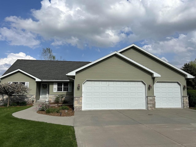 N5798 Lakeview Dr, Green Lake, WI 54941 - single story home with stone siding, concrete driveway, a garage, and a shingled roof