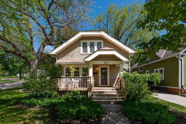 932 Poplar St, West Bend, WI 53095 - view of front of home featuring covered porch