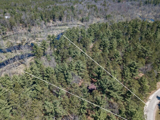 984 E Trout Valley Rd, Friendship, WI 54646 - aerial view of property and surrounding area featuring a heavily wooded area and property boundaries highlighted