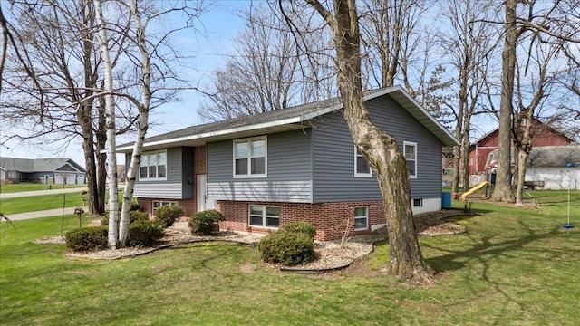 912 S 3rd Ave, Edgar, WI 54426 - view of front of property featuring a front lawn and a playground