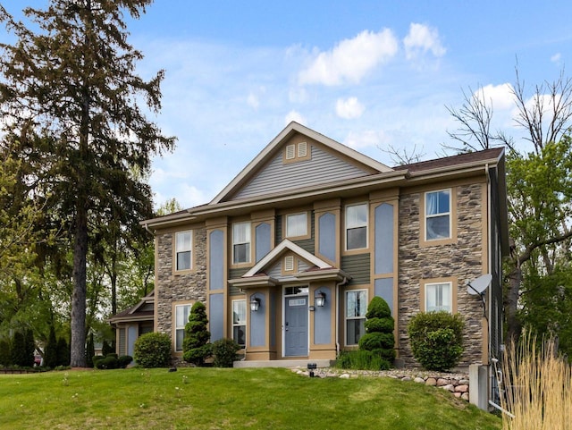 9318 W Mt Zion Dr, Milwaukee, WI 53224 - view of front of home with stone siding and a front yard