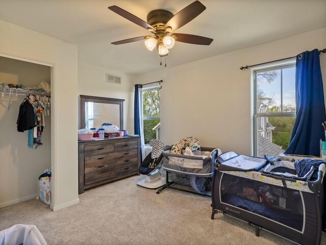 9318 W Mt Zion Dr, Milwaukee, WI 53224 - carpeted bedroom featuring a closet, ceiling fan, and baseboards