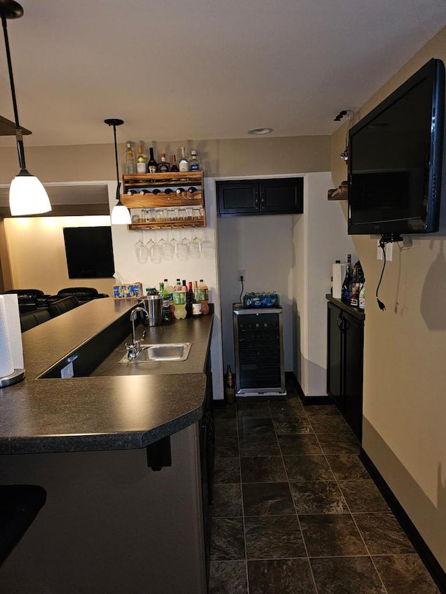9318 W Mt Zion Dr, Milwaukee, WI 53224 - indoor wet bar with pendant lighting and baseboards