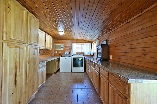 811 Russell St, Grantsburg, WI 54840 - kitchen featuring washing machine and clothes dryer, a peninsula, wooden ceiling, wooden walls, and tile patterned flooring