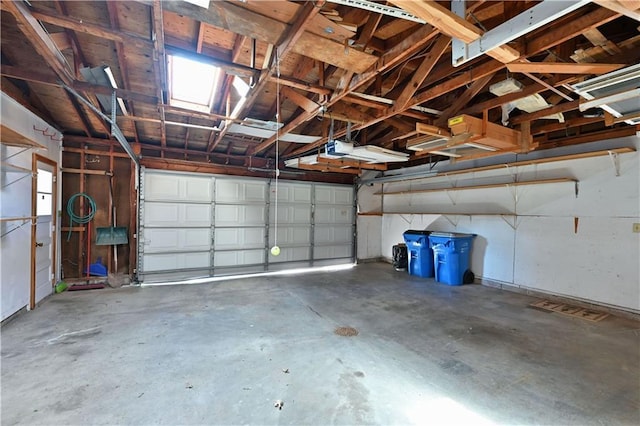 811 Russell St, Grantsburg, WI 54840 - garage featuring a garage door opener