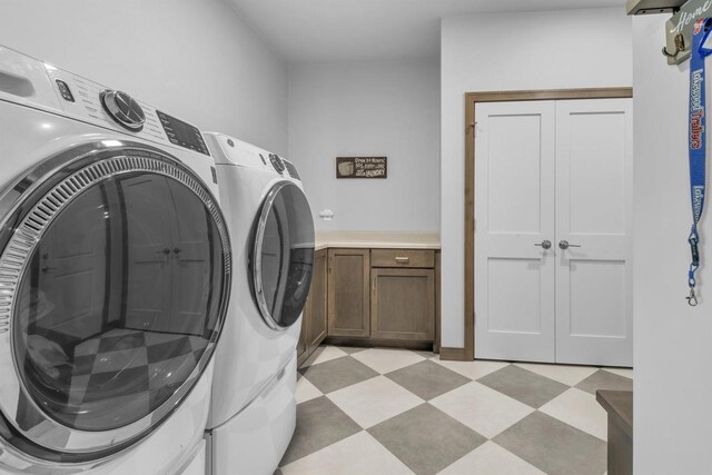 3153 Lazy Oak Ct, Green Bay, WI 54311 - laundry room with washing machine and dryer, light floors, and cabinet space