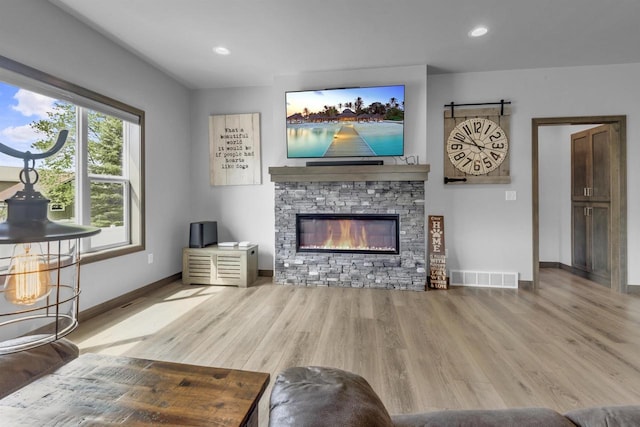3153 Lazy Oak Ct, Green Bay, WI 54311 - living area with baseboards, light wood finished floors, a fireplace, and recessed lighting