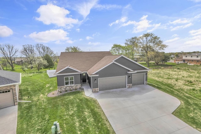 3153 Lazy Oak Ct, Green Bay, WI 54311 - craftsman inspired home featuring a garage, stone siding, driveway, and a front lawn