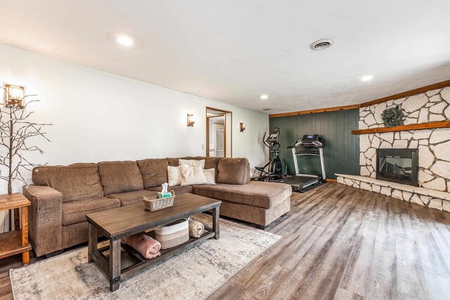 11915 Wedgewood Ln, Darlington, WI 53530 - living area featuring a fireplace, wood finished floors, and recessed lighting