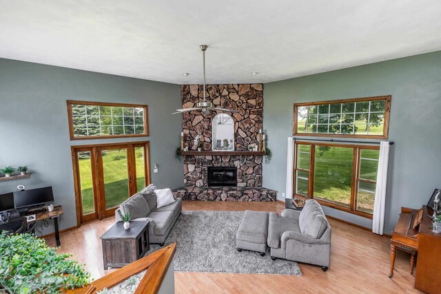 11915 Wedgewood Ln, Darlington, WI 53530 - living room featuring wood finished floors and a fireplace