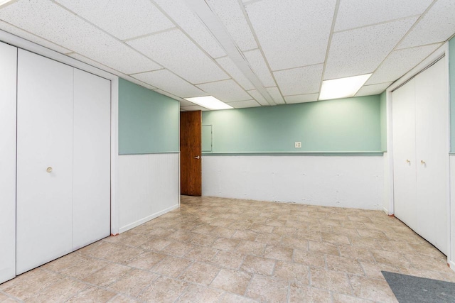 11915 Wedgewood Ln, Darlington, WI 53530 - finished below grade area with a drop ceiling and stone finish flooring