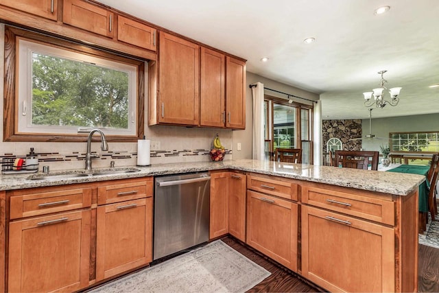 11915 Wedgewood Ln, Darlington, WI 53530 - kitchen with dishwasher, a peninsula, a sink, plenty of natural light, and recessed lighting