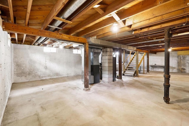 605 Douglas Trl, Madison, WI 53716 - below grade area featuring stairs and heating unit