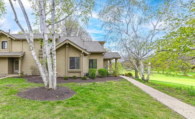 901 Duck Pond Rd, Fontana, WI 53125 - view of front of property featuring a front lawn and roof with shingles