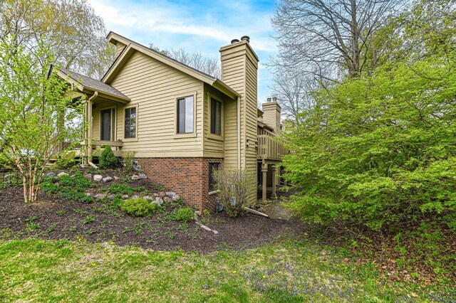 901 Duck Pond Rd, Fontana, WI 53125 - view of home's exterior featuring a chimney