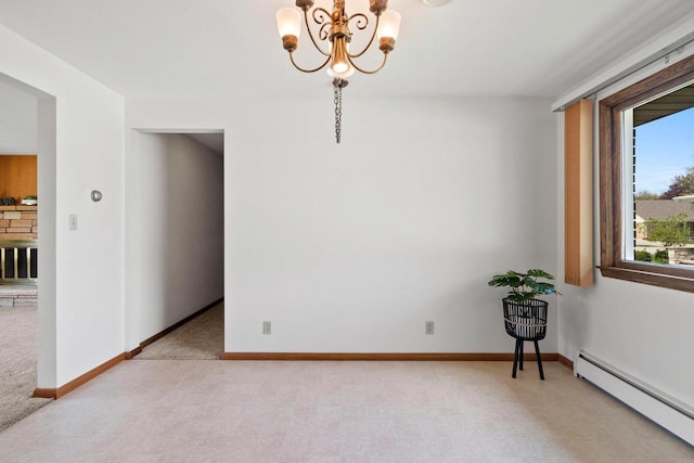 1020 W 3rd St, Kimberly, WI 54136 - unfurnished room with a baseboard heating unit, a chandelier, and baseboards