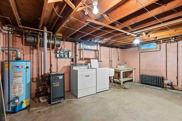 1020 W 3rd St, Kimberly, WI 54136 - below grade area with gas water heater, washer and dryer, radiator heating unit, and a heating unit
