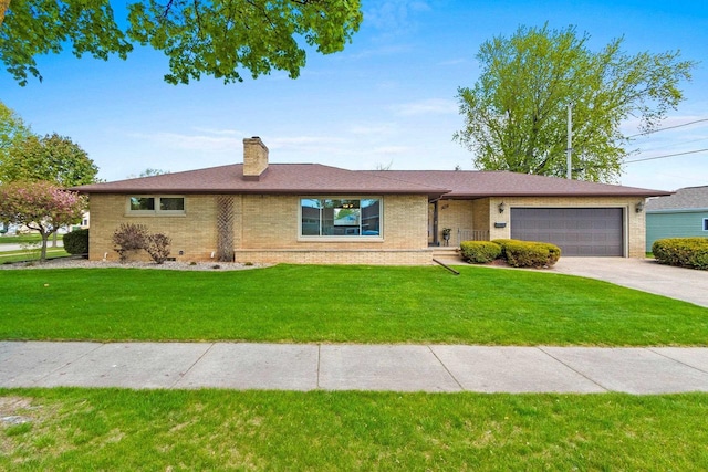 1020 W 3rd St, Kimberly, WI 54136 - single story home with a garage, brick siding, driveway, and a chimney