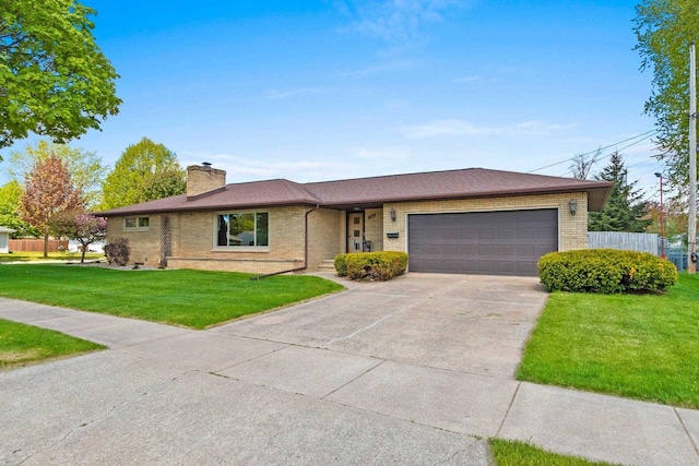 1020 W 3rd St, Kimberly, WI 54136 - ranch-style house with brick siding, a garage, a chimney, and driveway